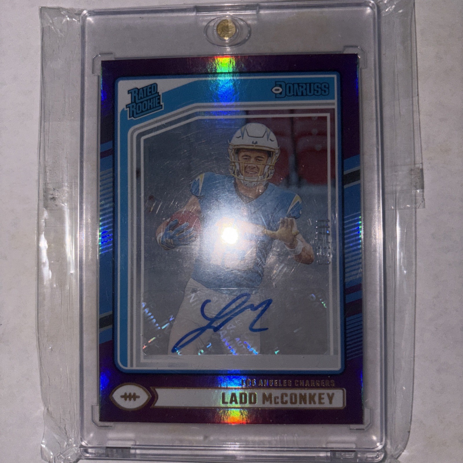 2024 Panini Donruss Rated Rookie Ladd McConkey #328 (RC) Purple Autographs /150