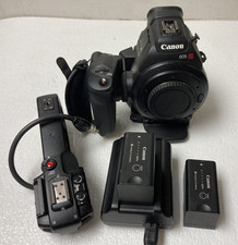 Canon EOS C100 Camera w/ 32GB SD Card Two Batteries  Charger  Handle No Lens