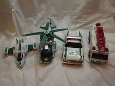 LOT OF 4 VINTAGE HESS TRUCKS TOY TRUCKS 1993 TO 2014 Fire, Patrol Car Helicopter