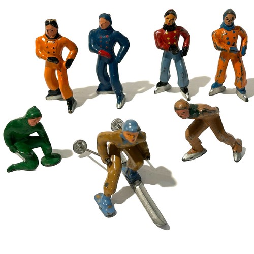 7 Vintage Barclay Lead Cast Metal Winter Series Toy Ice Skaters and Skier 1940s