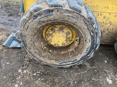 Gehl R165 Left/Driver Tire and Rim - Used