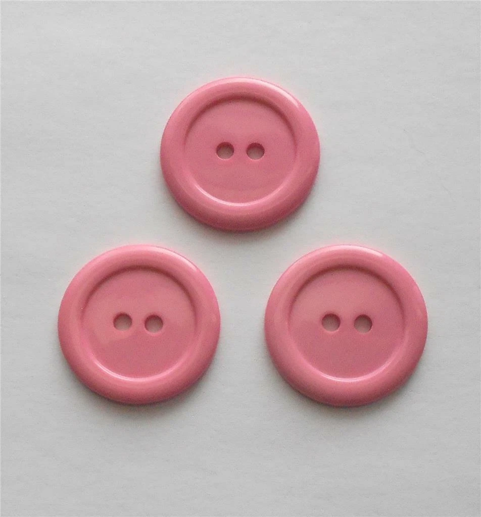 SET OF THREE PINK PLASTIC 1 1/8 DIA. ROUND 2-HOLE SEWING BUTTONS