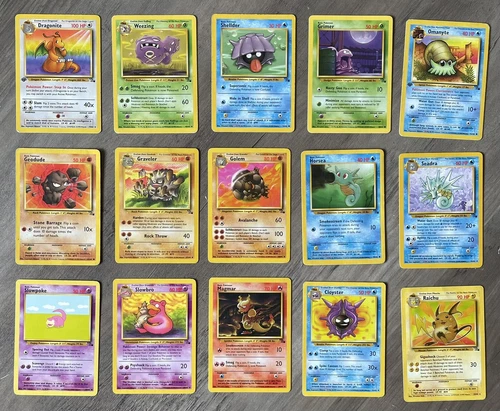15 Fossil Pokemon 1st Edition Dragonite & Omanyte. Slowbro, Weezing, Raichu