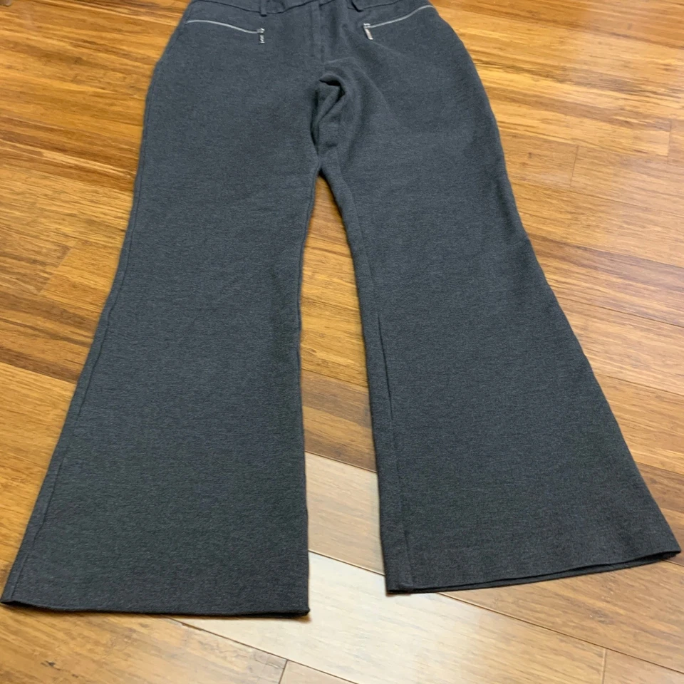 Pantalones acampanados grises DKNY para mujer bolsillos con cremallera elásticos talla 10 ropa de trabajo carrera Foto 3 de 4