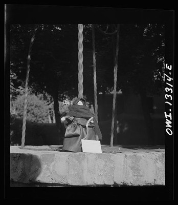 Photo:1930s-1940s Dressed Doll on Rope Well Stone Garden Display