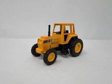 RI Novelty - Pull Back Die-Cast Vehicle - Yellow Farm Tractor 3.5”