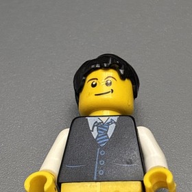 Lego twn104 Minifigure Black Vest Yellow Man 2010 From Set 10211 Grand Emporium