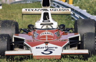 Emerson Fittipaldis McLaren M23 Ford on the side of the track duri- Old Photo