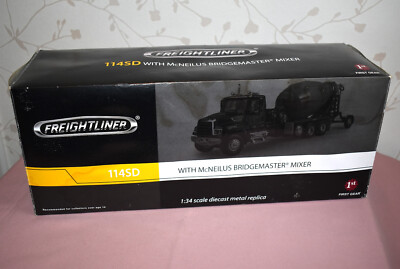 FIRST GEAR : 1:34 SCALE '' CARGOLINER '' 114SD & McNEILUS BRIDGEMASTER MIXER.