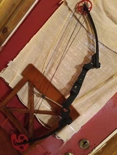 original Genesis left hand bow with case, arrows, arrow case, and equipment 