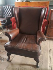 Leather wingback chair (damaged)