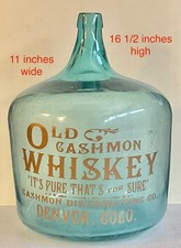 BOTTLE JUG DENVER COLORADO CASHMON WHISKEY 14.4 LBS 16 1/2 IN HIGH ADVERTISEMENT