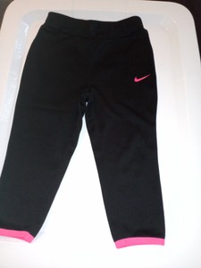 nike dri fit tracksuit black and pink