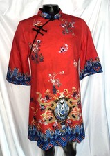 red modern Chinese-style qipao dress a striking circular crest graphic 3LX
