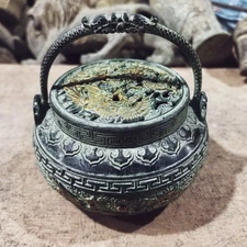 Old Bronze A incense burner with dragon and phoenix patterns and a lifting beam