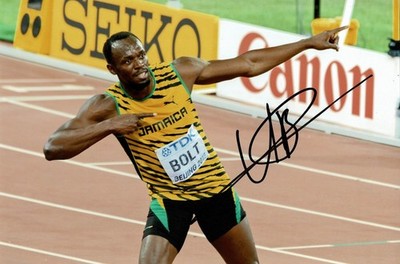 Olympiasieger Usain Bolt signiert 12x8 Blitz Pose Foto + Händler Echtheitszertifikat