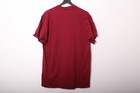 Maroon vintage 1990s T-shirt with crew neck, displayed on black hanger against plain white background.