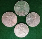 Lot of Four 2014 $1 American Silver Eagle Dollars