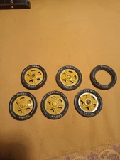 vintage tonka  truck set of 6 blackwalls and 5 yellow triangle hole hubcaps
