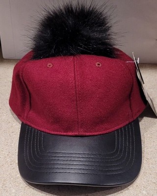 Leather baseball cap with fur ball on top