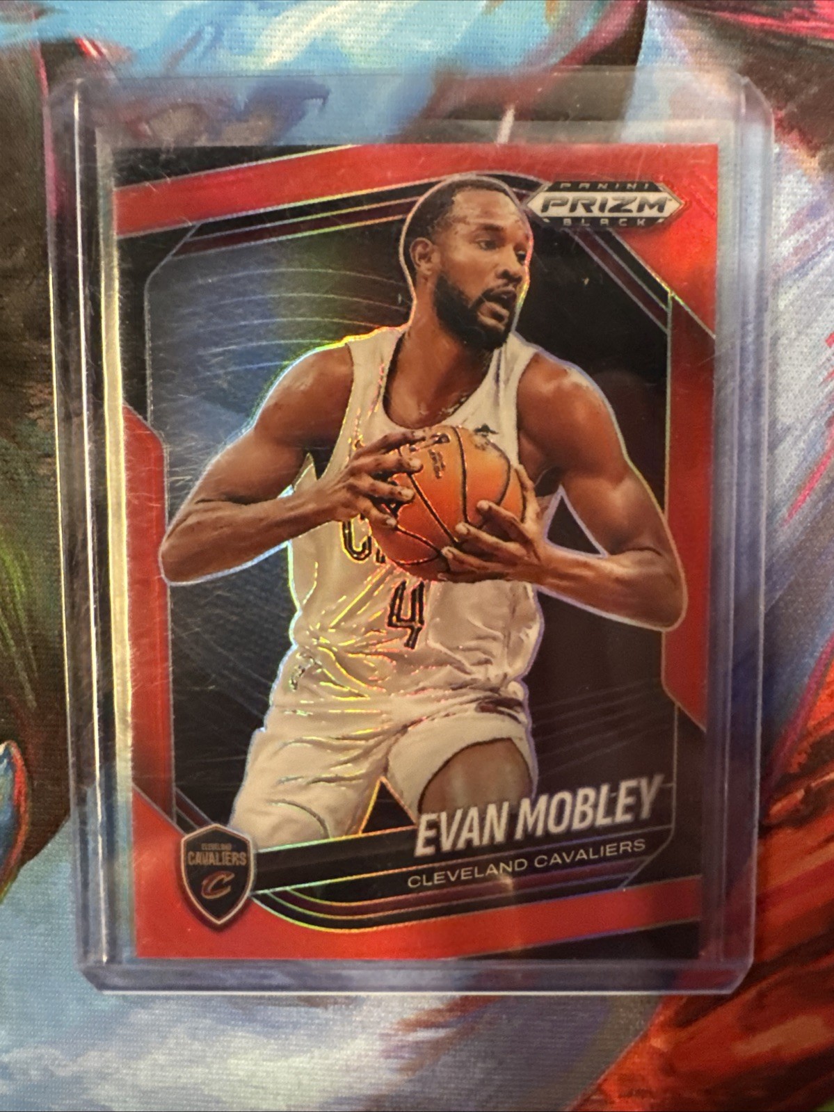 Evan Mobley 2024-25 Panini Prizm Black #121 Red Prizm /299 Cleveland Cavaliers