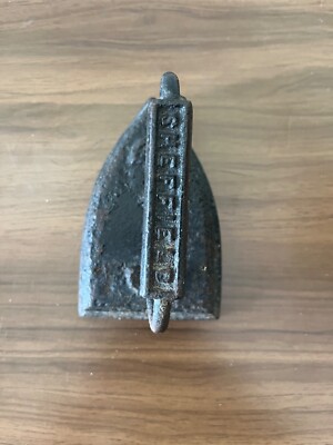 Vintage door stop Sheffield #7 cast iron clothing press ironing