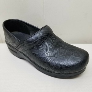 dansko embossed clogs