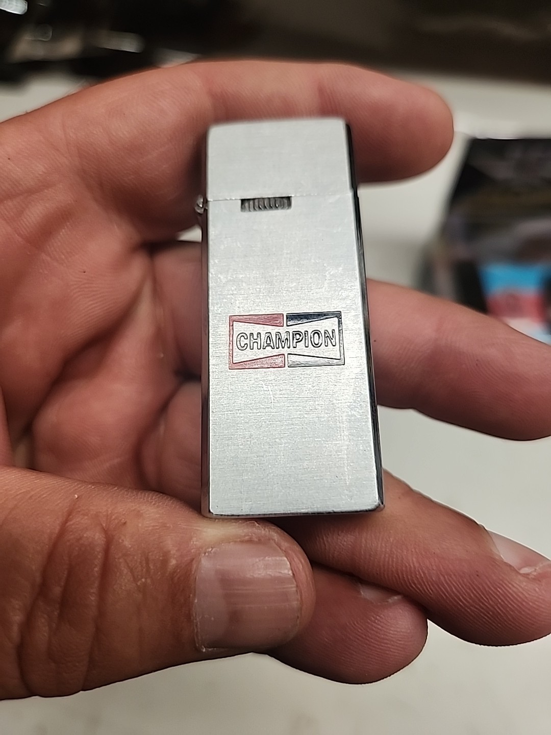 With Champion Spark Plug Logo
