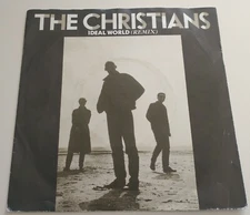 THE CHRISTIANS - IDEAL WORLD VINYL 7" IS 347.PLAYS EXCELLENT.