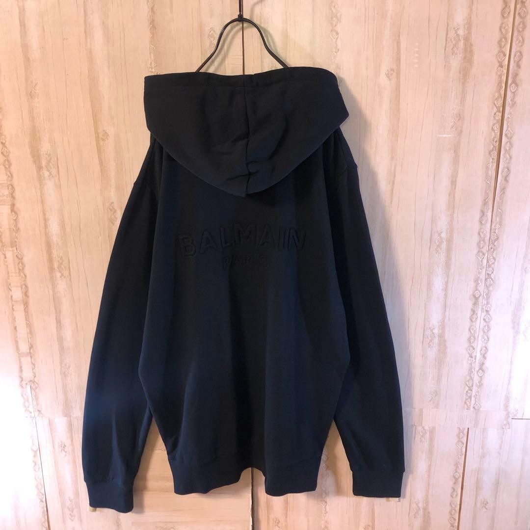 USED BALMAIN HOODIE WITH EMBOSSED LOGO ON THE BACK AND SIDE ZIPPER. GOOD image 2