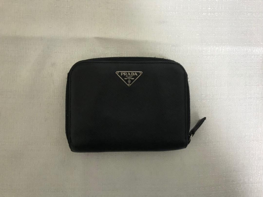 PRADA black leather round zip bifold wallet with logo detailing