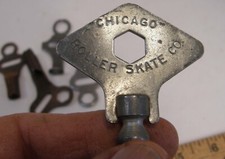 LOT 5 VINTAGE SKATE KEYS INCLUDING CHICAGO ROLLER SKATE COMPANY