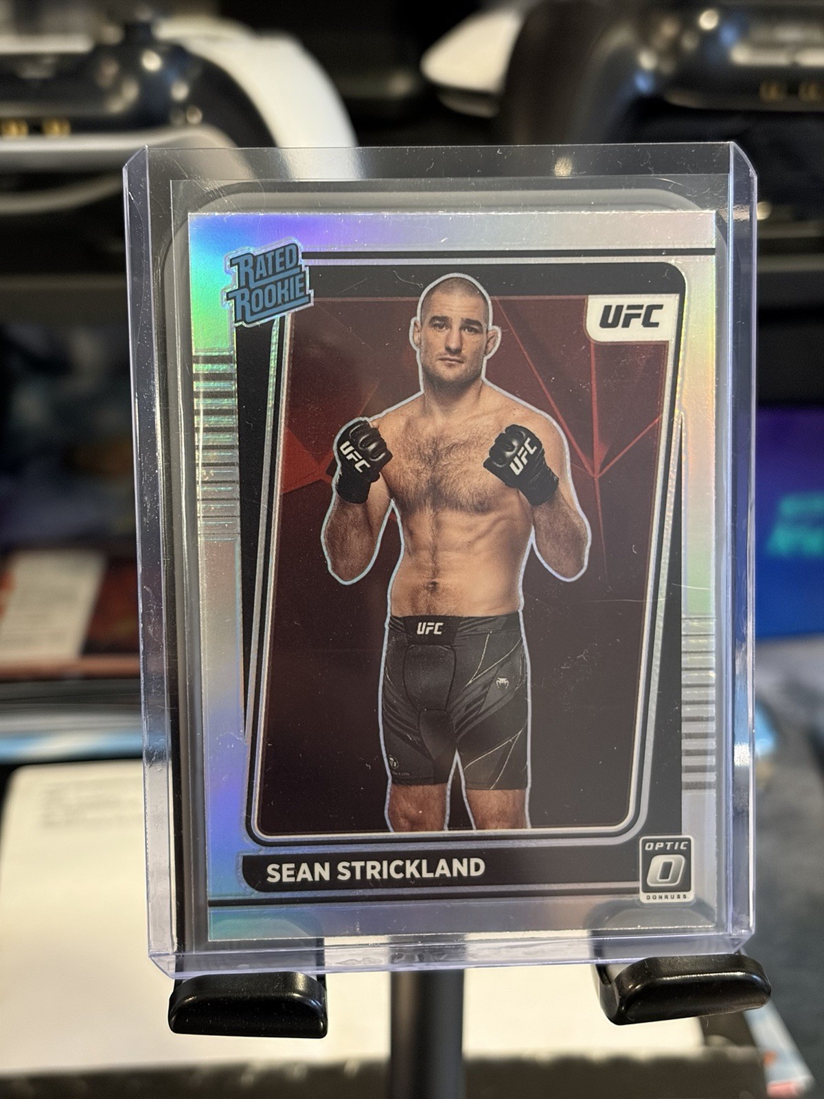 2022 Panini Donruss Optic UFC -Rated Rookie Sean Strickland #111 Holo Prizm (RC)