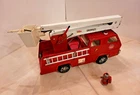 Vintage metal TONKA Snorkel Fire Truck  w/ 2 Hoses and ladder.  WORKS with water