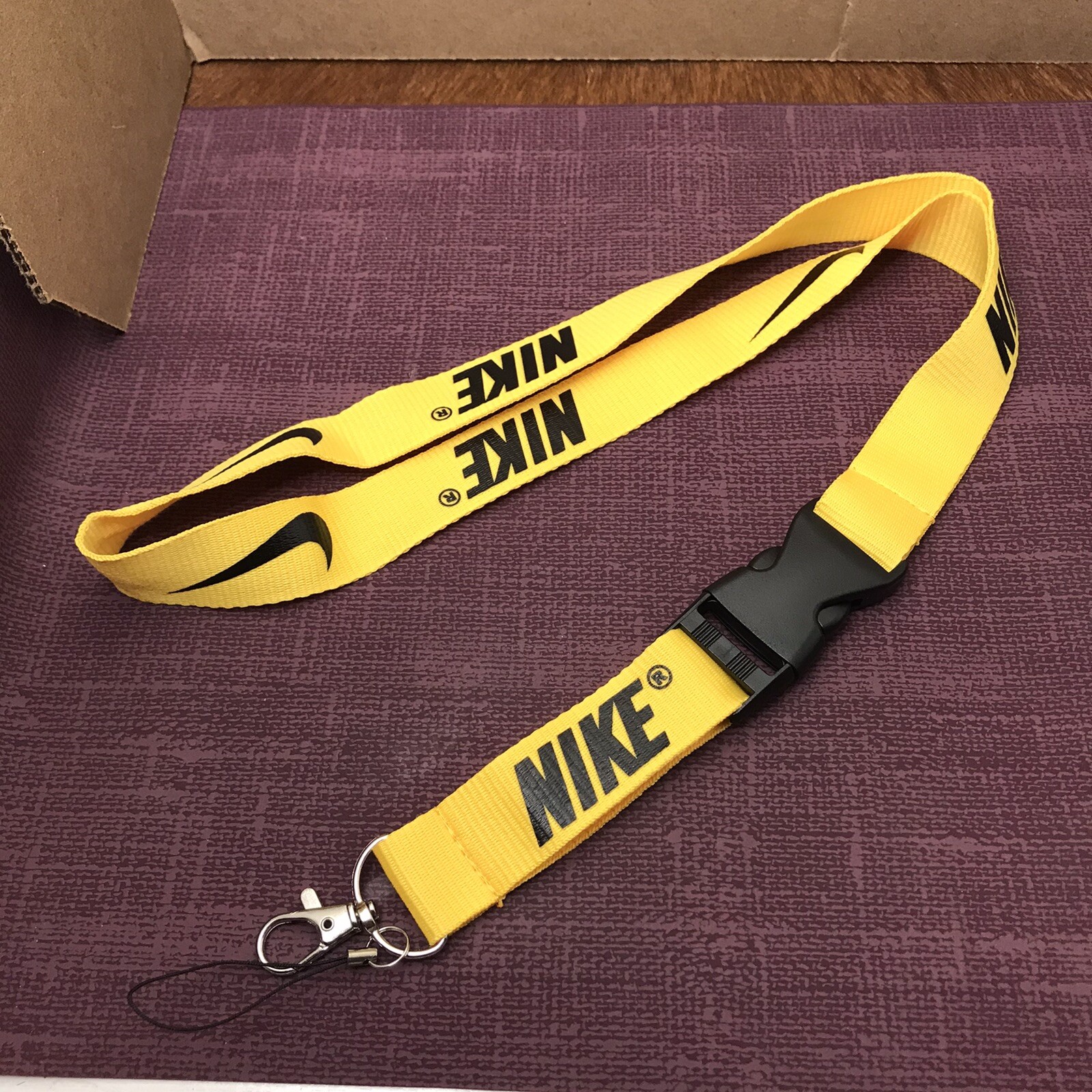 yellow nike lanyard