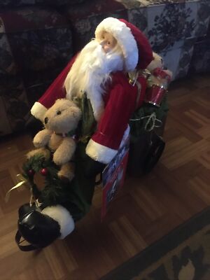 Large Santa Clause On A Tricycle. 19'' X 19'' X 10''.