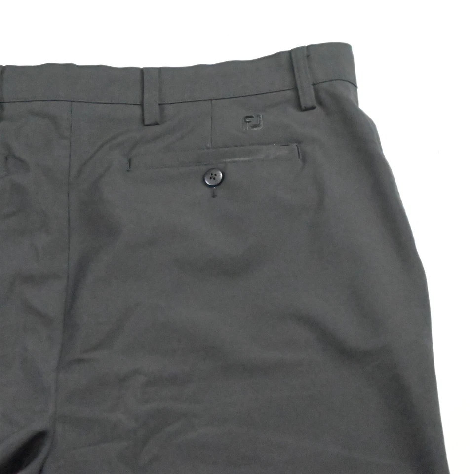 Pantalones cortos chinos FootJoy 36 x 10" negros que absorben el rendimiento de golf flexibles Foto 4 de 4
