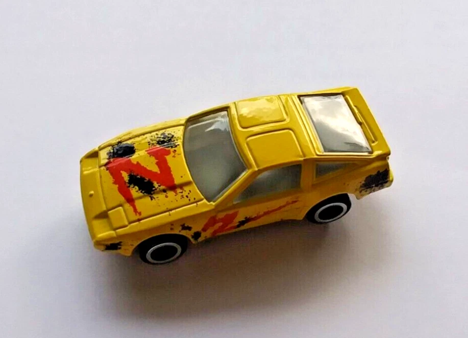 Tiras de metal fundido a presión ERTL Nissan 300ZX Z31 1/64 velocidades, nunca jugadas. Foto 4 de 4