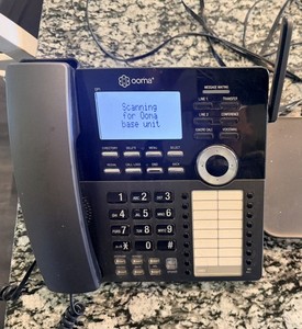 Ooma Office Phone Model DP1 and Brand New Base Station