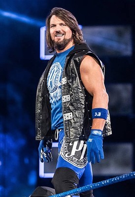 Styles smiles during SmackDown at Xcel Energy Center on February 2- Old Photo