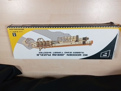 3D HOLZPUZZLE GUMMIBAND ZIELSCHEIBE Shooter Box geöffnet Inhalt Neu 