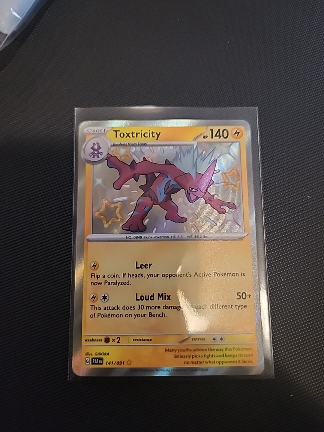 Toxtricity 141/091 Sv: Paldean Fates Holo