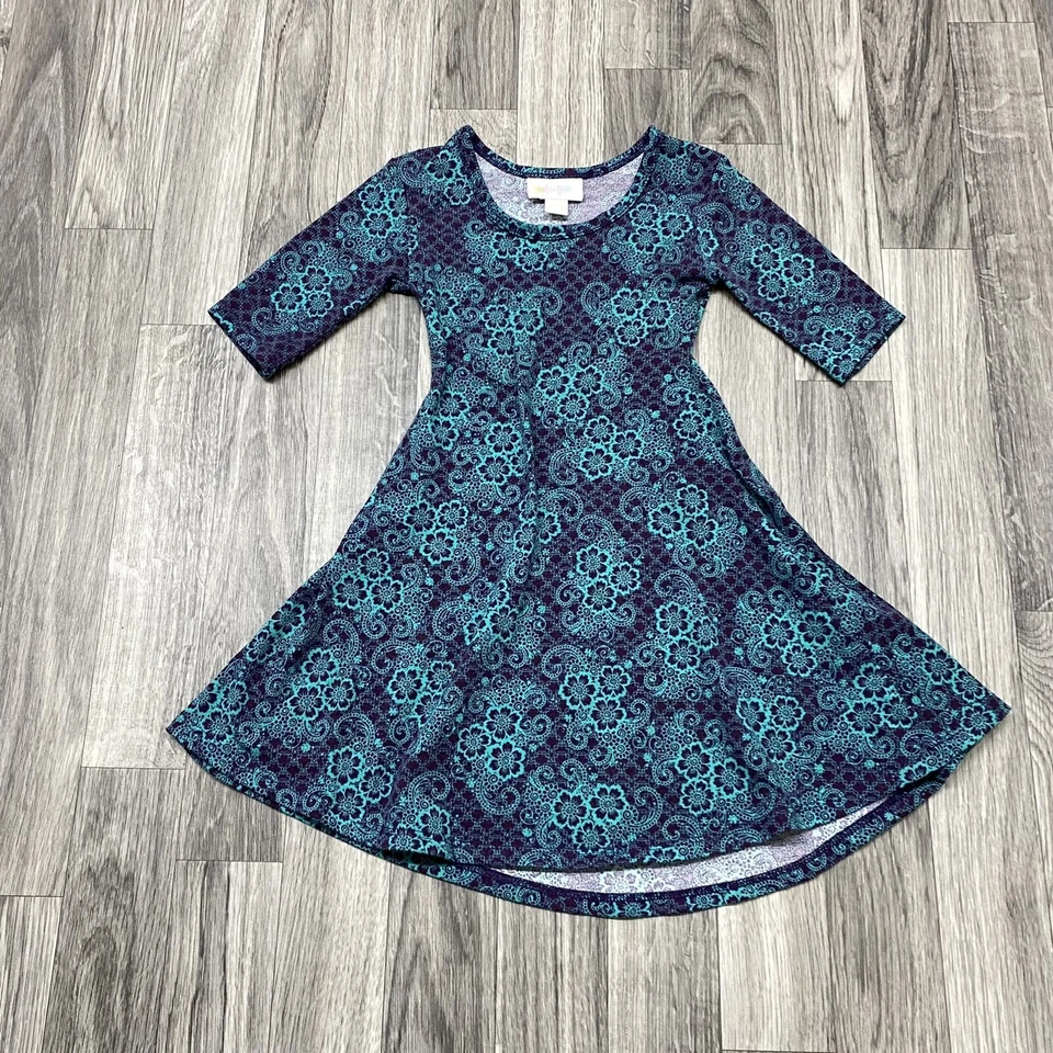 Vestido Camiseta Floral Verde y Púrpura LULAROE Cuello Redondo Mangas 3/4 Niña Talla 2 Foto 2 de 4
