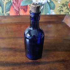 Vintage small cobalt blue bottle with original cork stopper