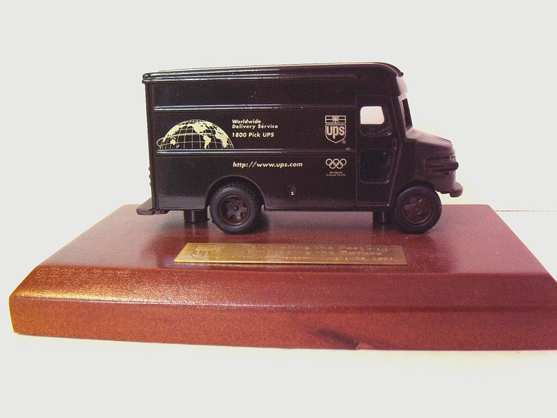 Collectible 90th anniversary 1997 UPS Deliversy Service Truck on wood stand