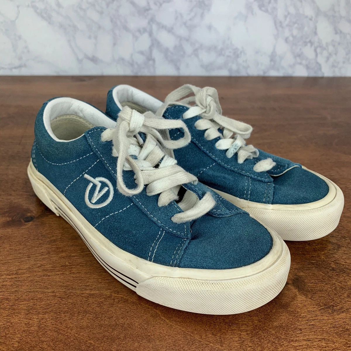 Light blue store suede vans