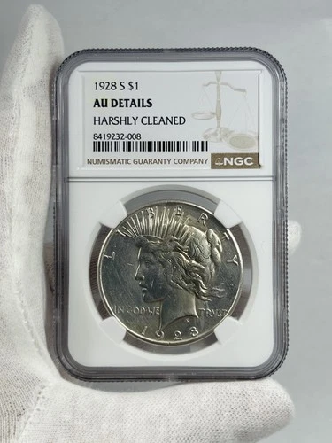 1928-S PEACE SILVER NGC AU DETAILS HARSHLY CLEANED $1 COIN