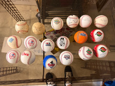 Lot of baseballs... Logo baseballs and a few signed baseballs