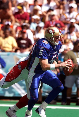 #ad Jeff Garcia NFC scrambles away from the pressure of Kevin Carter A Old Photo 2 AU $9.00