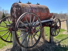 Vintage, full size antique oil tanker wagon with wooden wheels 